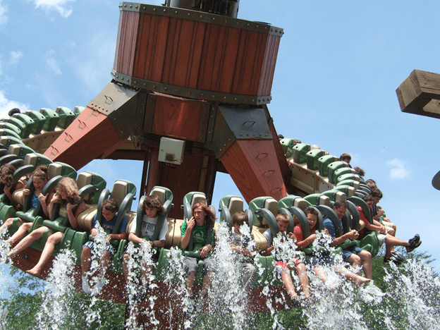 Thrill seekers on a water ride at Dollywood in Pigeon Forge, Tennessee, on a sunny summer day.