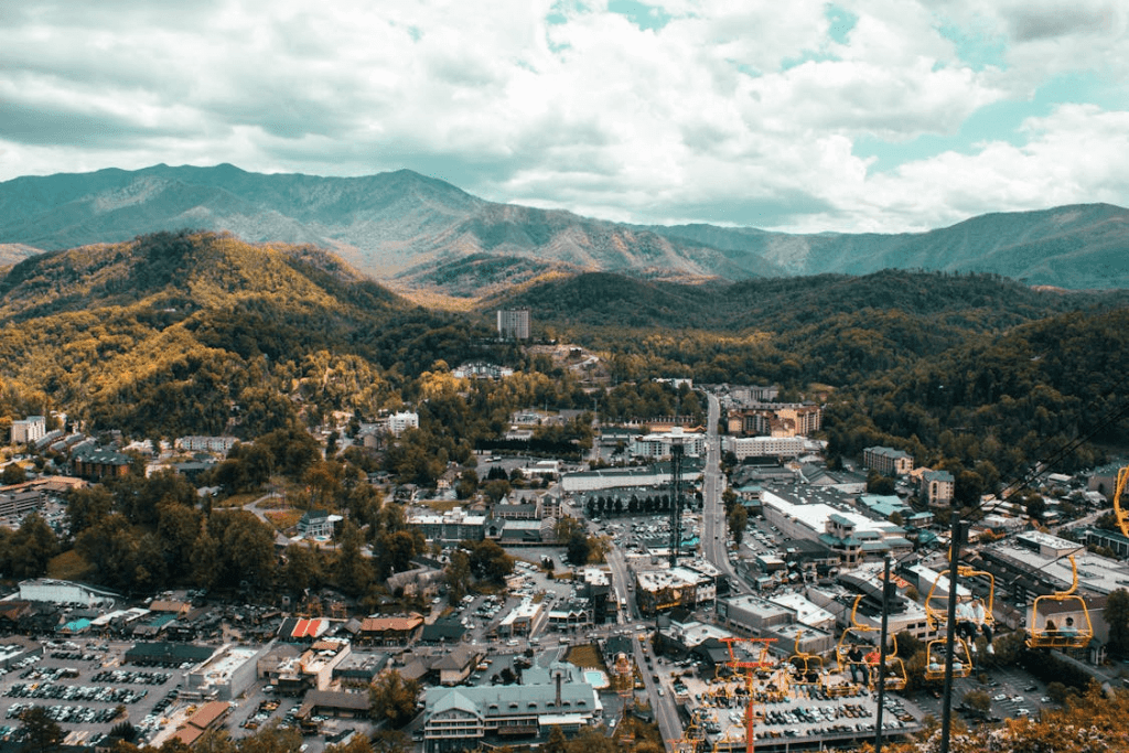 An aerial view of the city with Smoky Mountain backdrop – Pigeon Forge Tennessee vacation guide.