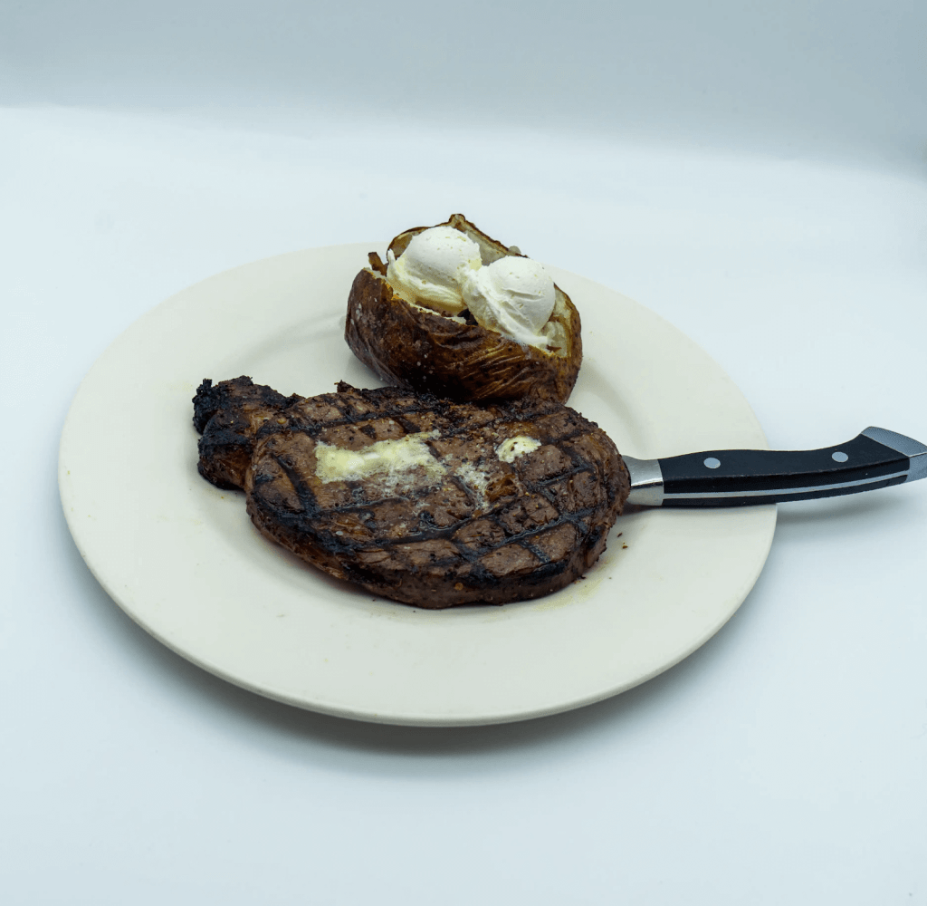 The Flame-Grilled Ribeye at Local Goat – highlight for best steakhouses in Pigeon Forge TN.